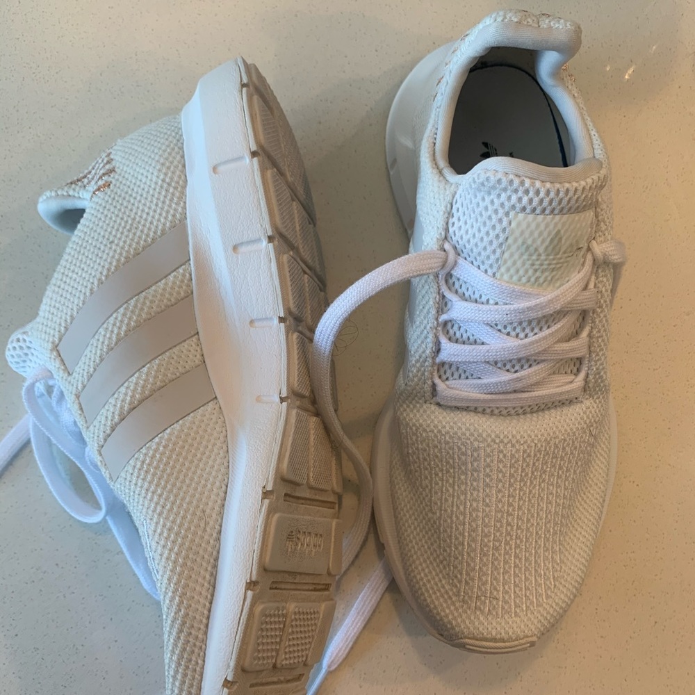 All white ADIDAS sneakers